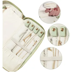 Portable travel jewelry case interior detail, anti-tangle necklace snaps, elastic bands.