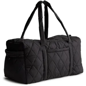 Detailed view of the black quilted travel duffel bag showcasing multiple pockets and durable straps.