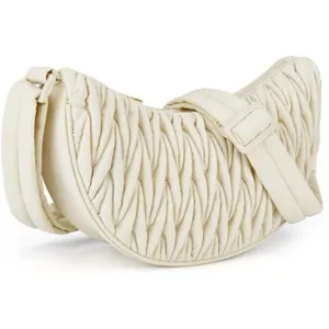 Detailed view of white quilted puffer crescent crossbody bag, soft texture, fashion daily shoulder bag.