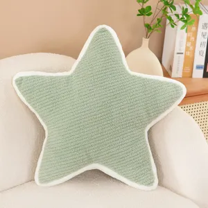 Cozy green star-shaped plush pillow with white piping, soft decorative cushion for sofa.