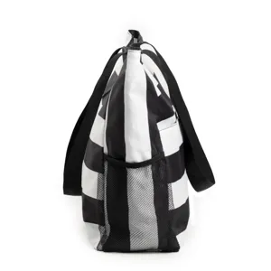 Detailed view of the large black and white striped waterproof beach tote bag with mesh pocket.
