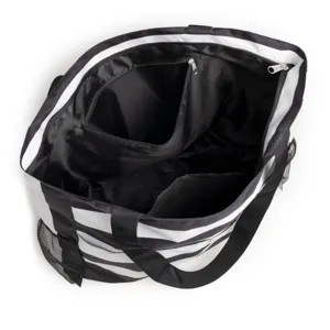 Detail view of interior zipper pocket and compartments in a striped beach tote bag.