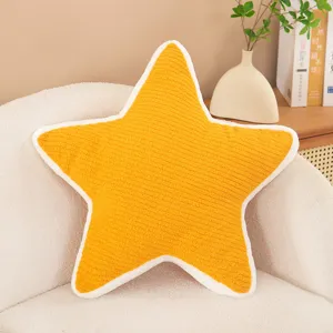 Nordic style star plush pillow detailed view, soft yellow cushion for cozy sofa decoration.