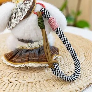 Plush toy detail keychain cute puppy pendant with woven strap and plaid dress decoration