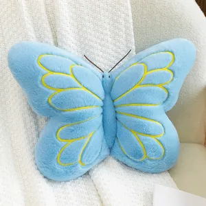 Blue butterfly plush pillow detailed view, soft stuffed toy cushion for sofa bedroom decor.
