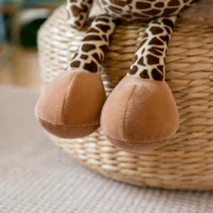 Cute giraffe plush toy detail shot, soft fabric and adorable design for girls and home decor.