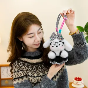 Plush puppy toy pendant detail, cute dog with glasses and striped dress, colorful strap.