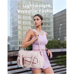 Detailed view of the lightweight versatile pink travel duffel bag in an urban setting.