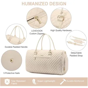 Beige quilted travel duffel bag with padded handles, detachable strap and durable zippers.
