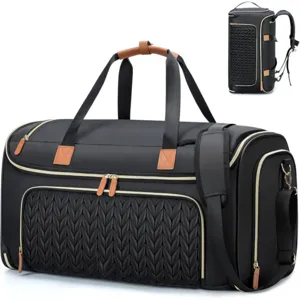 Black travel duffel bag detail, quilted front pocket, gold zippers and versatile strap options.