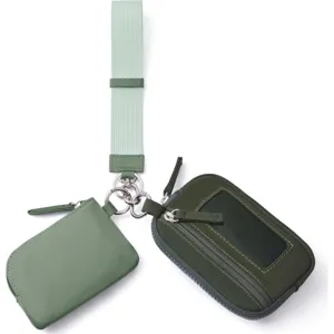 Detailed view of the multi-functional nylon wrist coin purse and card holder set in green.