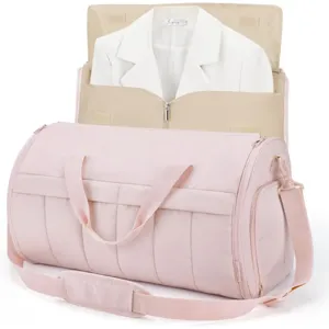 Pink travel garment duffel bag with hanging suit compartment for women business trips.