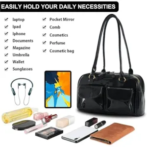 Detail view of black wax leather shoulder bag with spacious double front pockets capacity.