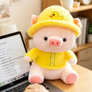 Cute plush pig toy doll with yellow duck hat soft stuffed animal pillow for kids gift.