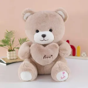Süßer Plüsch Teddybär mit Herz Kissen, weiches Kuscheltier Spielzeug als Kindergeburtstagsgeschenk.