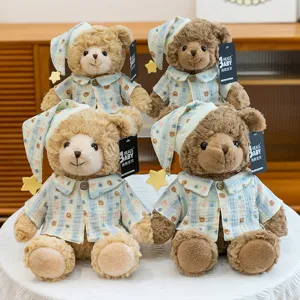 Cute plush teddy bear toy with soft pajamas and sleeping hat, perfect for kids companion.
