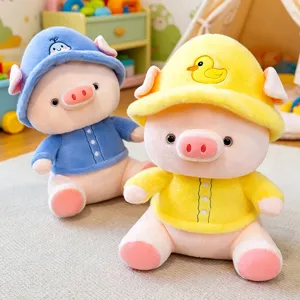 Cute plush pig doll detail shot, colorful stuffed animal toy with cute hat and outfit for kids.