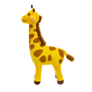 Detailed view of the cute yellow giraffe plush toy featuring soft fabric and brown spots.