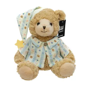 Cute plush teddy bear toy wearing striped pajamas and sleep cap with star detail, soft doll.