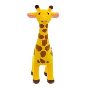 Close-up detail of the cute yellow giraffe plush toy showing soft fabric and brown spots.