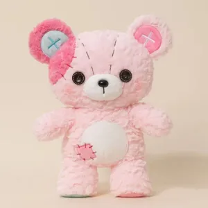 Cute pink patchwork plush bear toy with button eyes and stitched details for kids room decor.
