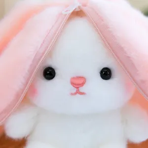 Cute transforming fruit rabbit plush toy pendant soft stuffed animal doll with zipper hood.