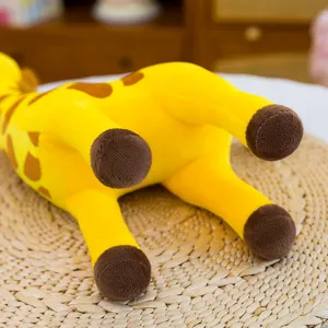 Cute giraffe plush toy detail shot, showing soft yellow fur and brown hooves clearly.
