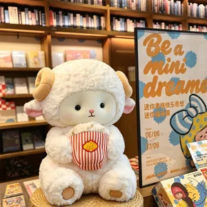 Close-up detail of the cute sitting sheep plush toy holding a popcorn bucket in scene display.