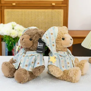 Cute couple teddy bear plush toys wearing matching pajamas and nightcaps, soft stuffed animal dolls.