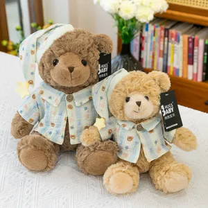 Cute couple teddy bear plush toys in matching sleepwear and caps, soft soothing dolls.