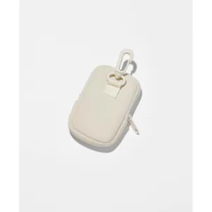 Close-up detail of the mini beige zipper pouch with spring hook for daily portable storage.