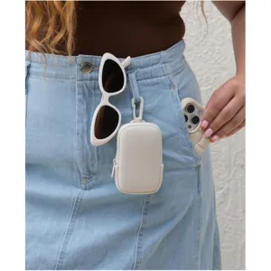 Mini beige zipper pouch with spring hook detail, perfect for small essentials and coins.