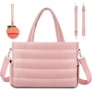Detail view of pink quilted diaper tote bag with peach accessory and adjustable straps for mom.