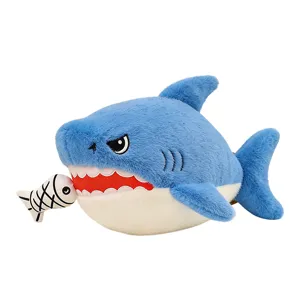 Cute blue shark plush toy pillow with small fish, soft stuffed doll for kids and home bed decor.