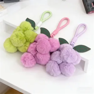 Cute fluffy grape plush bag charm, soft faux rabbit fur keychain pendant with leather leaf.