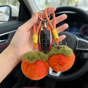 Cute plush persimmon bag charm and car keychain, fluffy faux rabbit fur pendant for women gifts.
