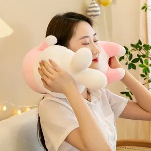 Detail view of the cute pink and white rabbit plush pillow, soft companion toy for sleeping.