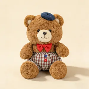 Cute plush bear toy detail view, featuring adorable beret and bow tie, soft fabric finish.