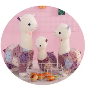 Cute snowflake alpaca plush toy set detail showing soft fluffy texture and cute embroidered face.
