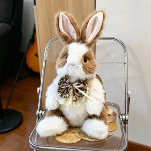Mooie realistische pluizige konijn pluche knuffel rugzak met schattige bloemenstrik.