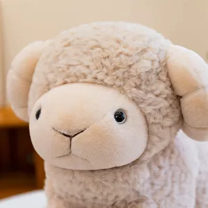 Soft plush lamb toy detail view, cute fluffy stuffed animal closeup with curly horns, cozy.