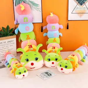 Detailed view of colorful caterpillar plush toys arranged neatly in a cozy indoor setting.