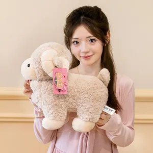 Detailed view of the cute fluffy sheep plush toy held by a model, soft and adorable.