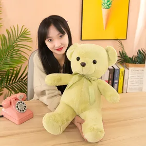 Soft green teddy bear plush toy with bowknot, perfect companion gift for kids and cute room decor.