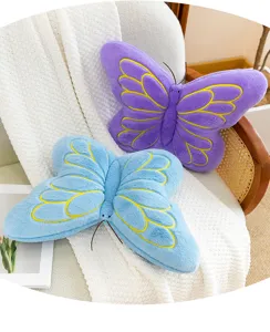 Soft plush butterfly throw pillows in blue and purple, cozy sofa back cushions for home decor.