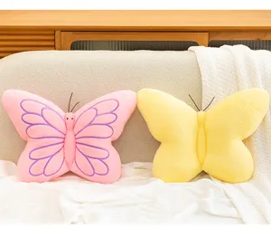 Cozy butterfly plush pillow detail shot, soft plush material, perfect sofa cushion for home decor.