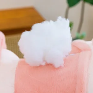 Cute pink plush toy detail fluffy white tail soft stuffed animal doll cushion gift.