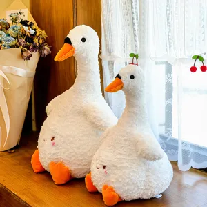 Cute white plush duck goose stuffed animal toy, soft fluffy companion doll for kids room decor.