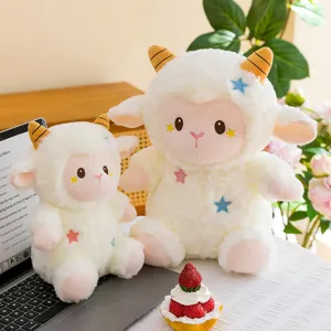 Detail shot of cute fluffy sheep plush toys with golden horns and colorful star embroidery.
