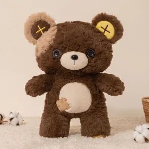 Detailed close-up of a cute brown plush teddy bear featuring unique button eyes and patches.